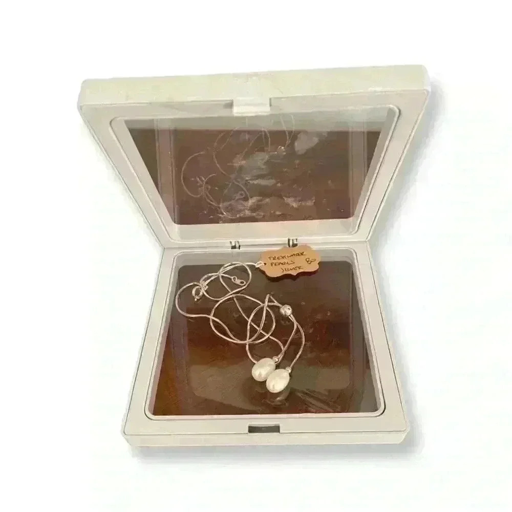 NWT Sterling Silver and Freshwater Pearls Necklace.